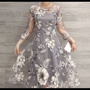 Grey floral organza with black and white blossoms